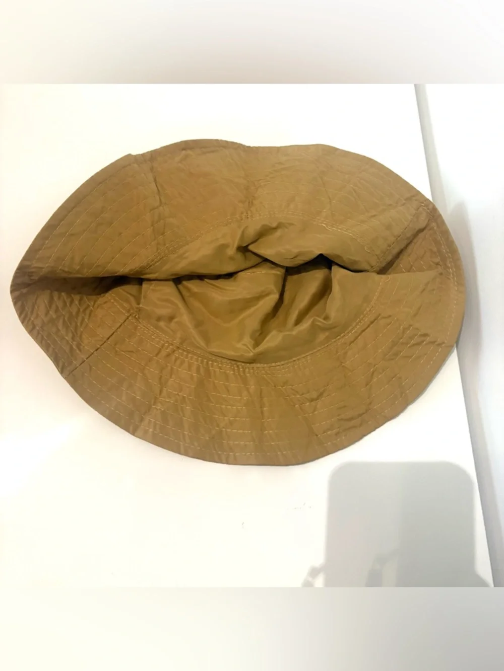 Lightweight Brown Bucket Hat with Red-Orange Wave Detail Never used
